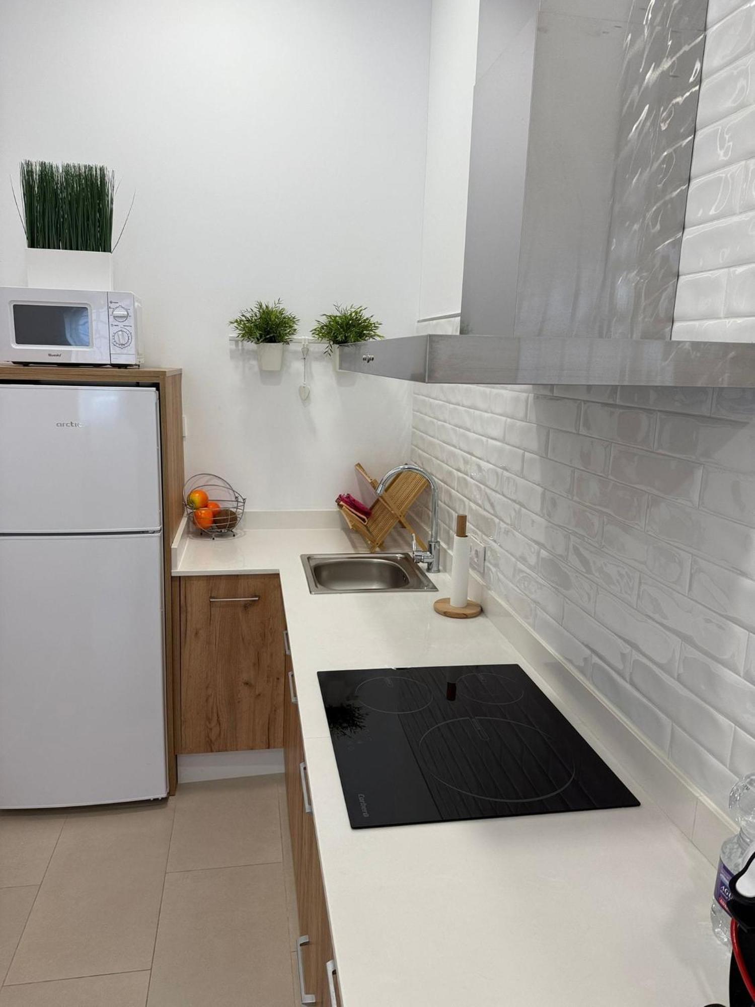 Apartamento Turistico Leo Baena Bagian luar foto